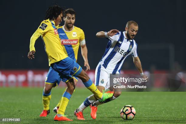 Porto's Portuguese midfielder Andre Andre vies with Arouca's forward Kuca during Premier League 2016/17 match between FC Arouca and FC Porto, at...