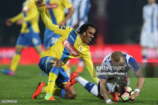 Porto's Portuguese midfielder Andre Andre vies with Arouca's forward Kuca during Premier League 2016/17 match between FC Arouca and FC Porto, at...