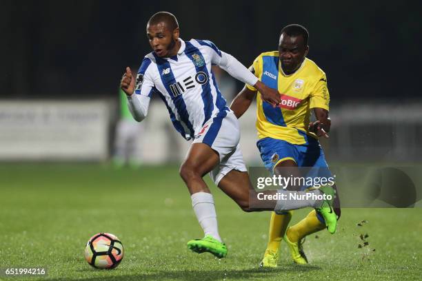 Porto's Algerian forward Yacine Brahimi vies with Arouca's forward Mateus during Premier League 2016/17 match between FC Arouca and FC Porto, at...