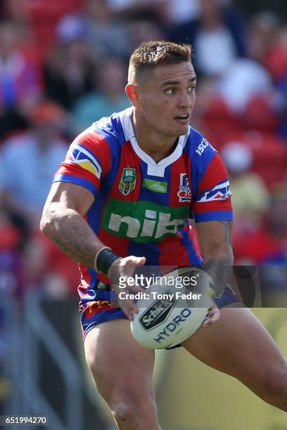Danny Levi of the Knights looks to pass the ball during the round two NRL match between the Newcastle Knights and the Gold Coast Titans at McDonald...