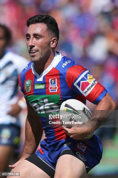 Brock Lamb of the Knights runs the ball during the round two NRL match between the Newcastle Knights and the Gold Coast Titans at McDonald Jones...
