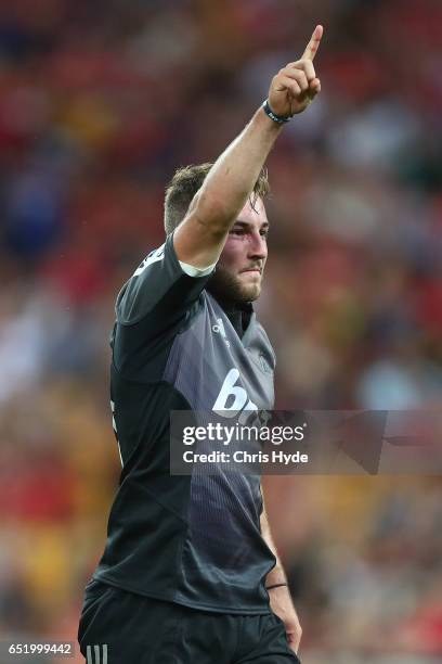 Mitchell Hunt of the Crusaders celebrates winning the round three Super Rugby match between the Reds and the Crusaders at Suncorp Stadium on March...