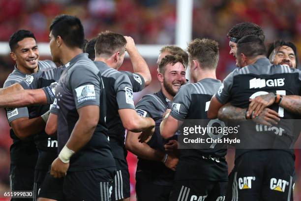 Crusaders celebrate winning the round three Super Rugby match between the Reds and the Crusaders at Suncorp Stadium on March 11, 2017 in Brisbane,...