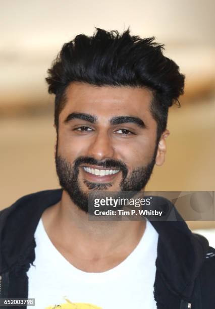 Bollywood Star Arjun Kapoor attends a photocall for the Bollywood comedy 'Mubarakan' on March 11, 2017 at the Sheraton Park Lane Hotel in London,...
