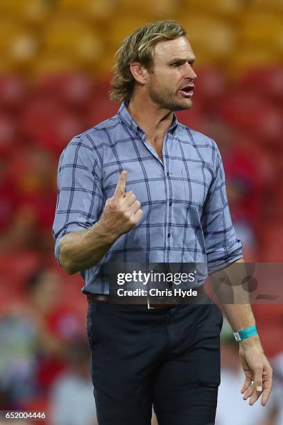 Crusaders Head Coach Scott Robertson looks on during warm up before the round three Super Rugby match between the Reds and the Crusaders at Suncorp...