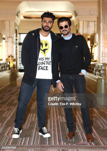 Bollywood Stars Arjun Kapoor and Anil Kapoor attend a photocall for the Bollywood comedy 'Mubarakan' on March 11, 2017 at the Sheraton Park Lane...