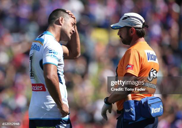 Jarryd Hayne of the Titans is injured during the round two NRL match between the Newcastle Knights and the Gold Coast Titans at McDonald Jones...