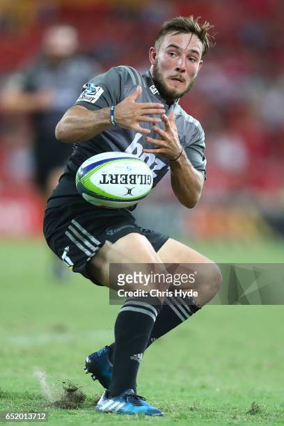 Mitchell Hunt of the Crusaders drops the ball during the round three Super Rugby match between the Reds and the Crusaders at Suncorp Stadium on March...