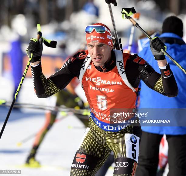 Winner Germany's Arnd Peiffer competes during the men's 12,5 km pursuit at the IBU Biathlon World Cup in Kontiolahti, Finland on March 11, 2017. /...