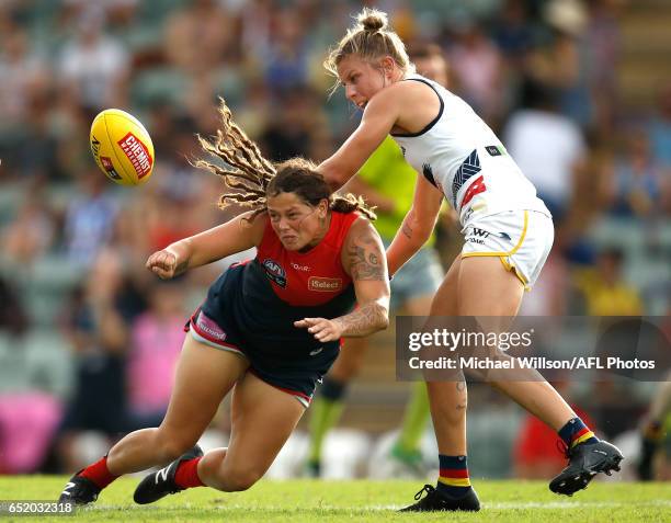 Richelle Cranston of the Demons and Kellie Gibson of the Crows compete for the ball during the 2017 AFLW Round 06 match between the Adelaide Crows...