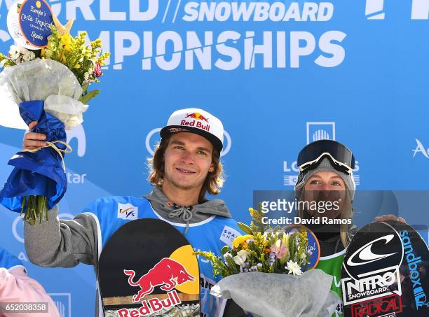 Seppe Smits of Belgium and Laurie Blouin of Canada celerate winning their Gold medals during the medal ceromeny after their Slopestyle Finals on day...