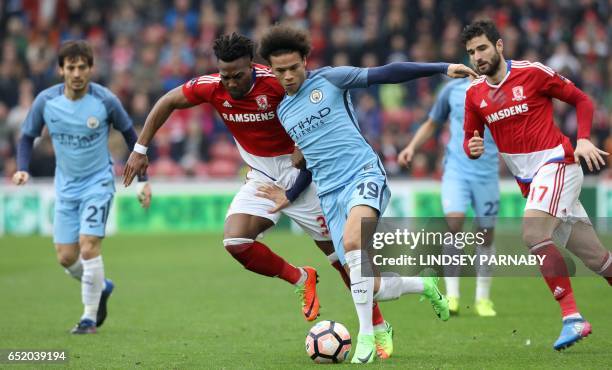 Manchester City's German midfielder Leroy Sane vies with Middlesbrough's Spanish midfielder Adama Traoré during the English FA cup quarter final...