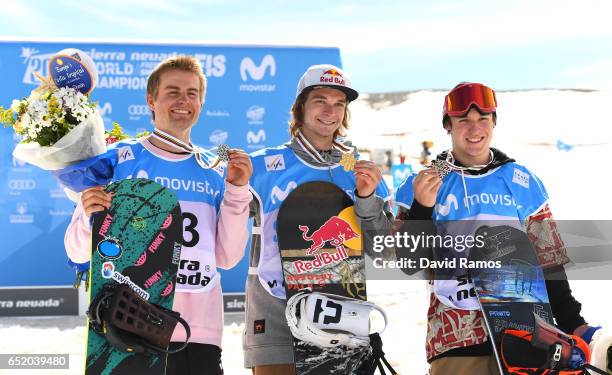 Nicolas Huber of Switzerland , Seppe Smits of Belgium and Chris Corning of the United States celebrate winning their medals during the medal ceromeny...