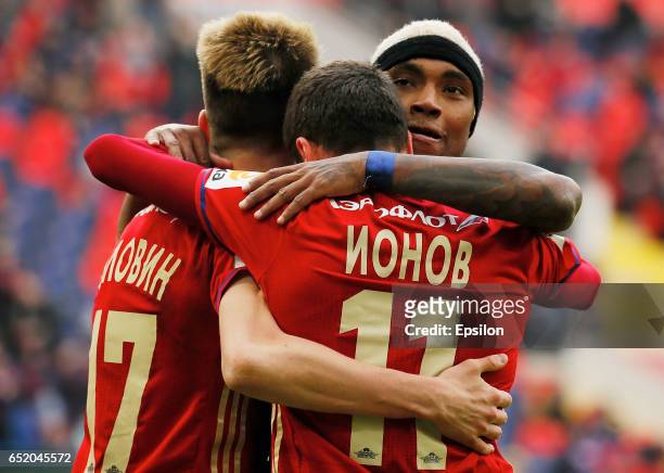 Alexander Golovin, Alexey Ionov and Vitinho of PFC CSKA Moscow celebrate a goal during the Russian Premier League match between PFC CSKA Moscow and...