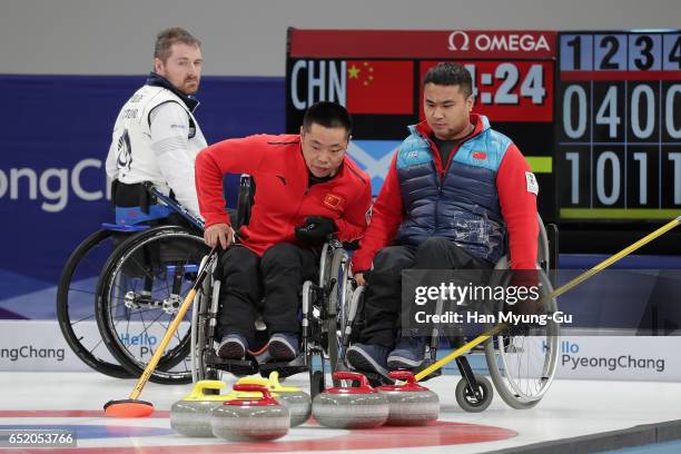 Wei Liu and Haitao Wang from China react during the final in the World Wheelchair Curling Championship 2017 - test event for PyeongChang 2018 Winter...