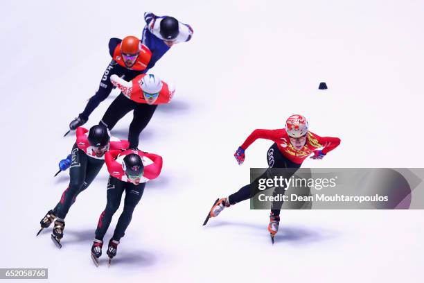 Ren Ziwei of China and Sjinkie Knegt of the Netherlands compete in the 1500m Mens Semi Final at ISU World Short track Speed Skating Championships...