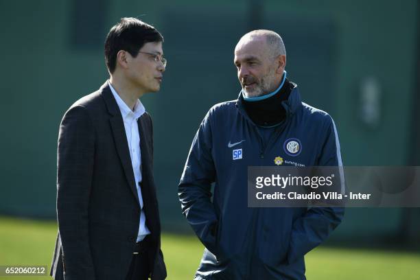 Of FC Internazionale Milano Jun Liu and Head coach FC Internazionale Stefano Pioli FC Internazionale chat prior to the training session at Suning...