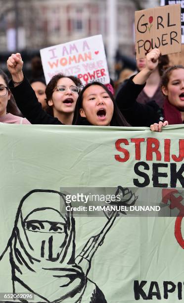 People take part in the anti-racism demonstration called "Womens march for a united Netherlands" ahead of the Dutch parliamentary elections in...