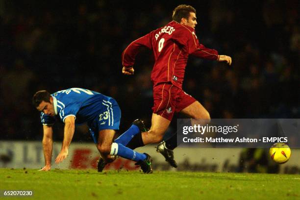 Cardiff City's Chris Barker loses out to Oldham Athletic's Ben Burgess