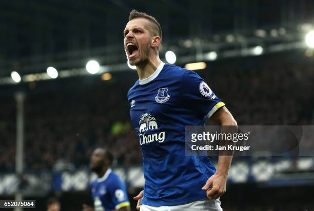 Morgan Schneiderlin of Everton celebrates scoring his sides second goal during the Premier League match between Everton and West Bromwich Albion at...