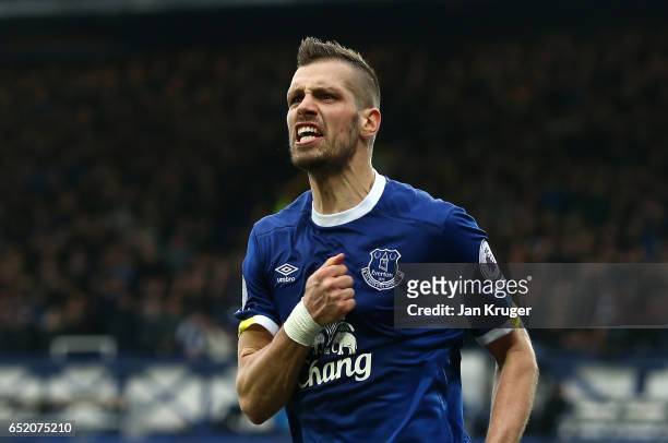 Morgan Schneiderlin of Everton celebrates scoring his sides second goal during the Premier League match between Everton and West Bromwich Albion at...