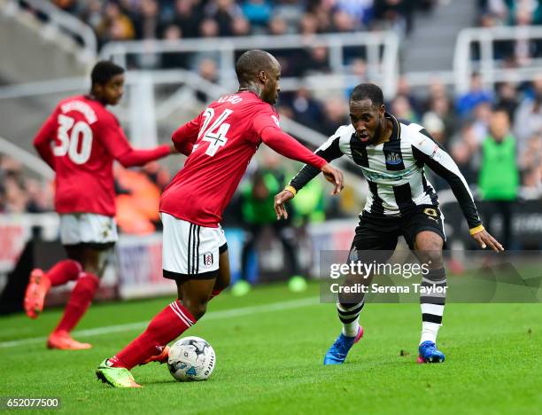 Vurnon Anita of Newcastle United looks to challenge Stefan Johansen of Fulham during the Sky Bet Championship Match between Newcastle United and...