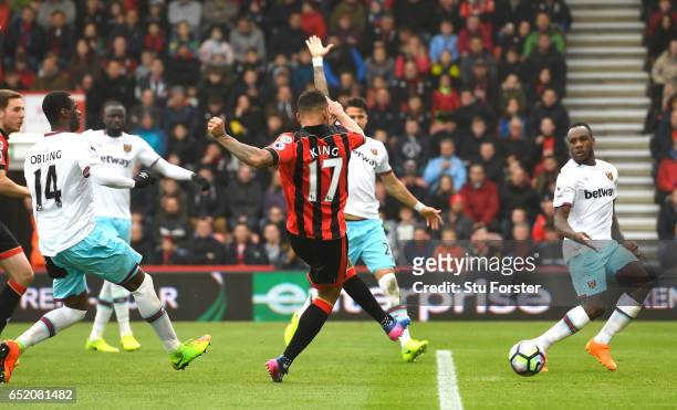 Joshua King of AFC Bournemouth scores their second goal during the Premier League match between AFC Bournemouth and West Ham United at Vitality...