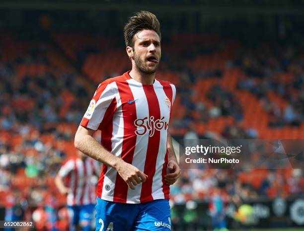 Duje Cop of Real Sporting de Gijon celebrates his goal during their La Liga match between Valencia CF and Real Sporting de Gijon at the Estadio de...