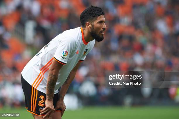 Ezequiel Garay of Valencia CF looks on during their La Liga match between Valencia CF and Real Sporting de Gijon at the Estadio de Mestalla on 11...