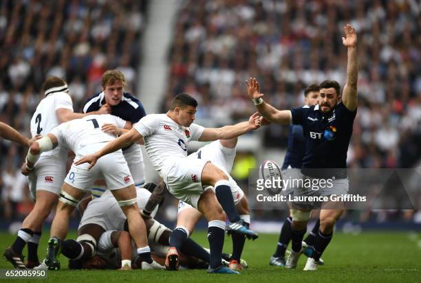 Alex Dunbar of Scotland attempts a charge down Nathan Hughes of England kick during the RBS Six Nations match between England and Scotland at...