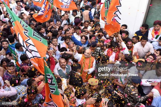 President Amit Shah arrives to address a press conference after landslide victory in Uttar Pradesh and Uttarakhand assembly elections at BJP HQ at...