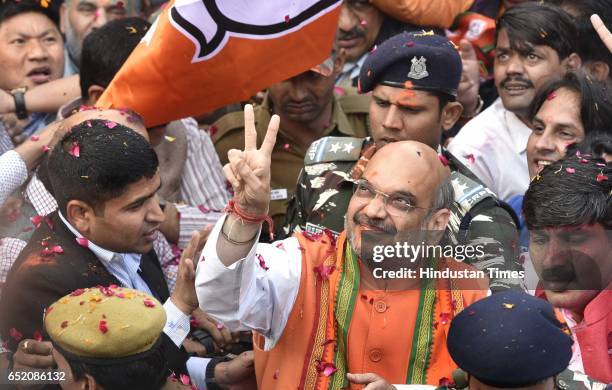 President Amit Shah arrives to address a press conference after landslide victory in Uttar Pradesh and Uttarakhand assembly elections at BJP HQ at...