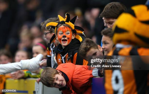 Fans enjoy the atmosphere at half time during the Premier League match between Hull City and Swansea City at KCOM Stadium on March 11, 2017 in Hull,...