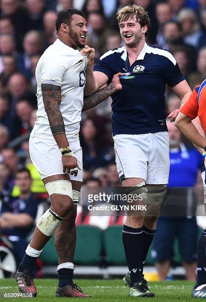England's lock Courtney Lawes and Scotland's lock Richie Gray grapple with each othter during the Six Nations international rugby union match between...
