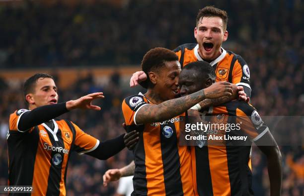 Oumar Niasse of Hull City celebrates scoring his sides first goal with his Hull City team mates during the Premier League match between Hull City and...