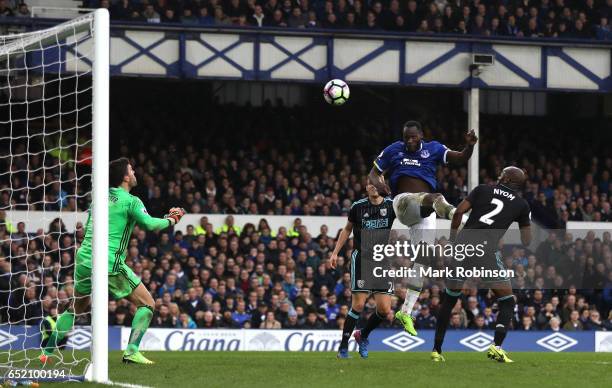 Romelu Lukaku of Everton scores his sides third goal during the Premier League match between Everton and West Bromwich Albion at Goodison Park on...