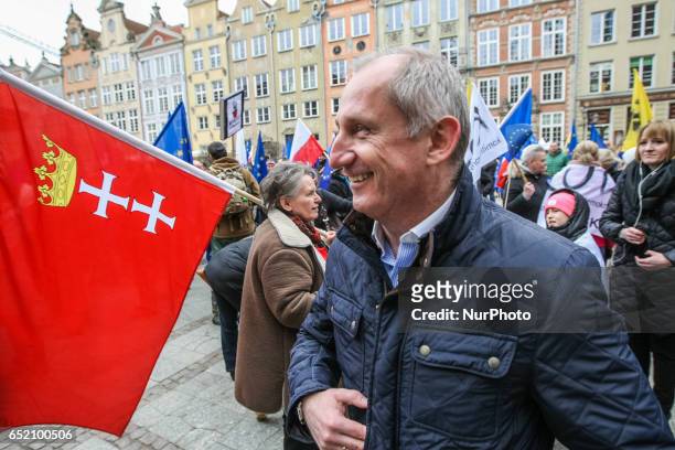 Parliament member Slawomir Neumann and protesters with European Union and Polish flags and anti-government slogans are seen on 11 March 2017 in...