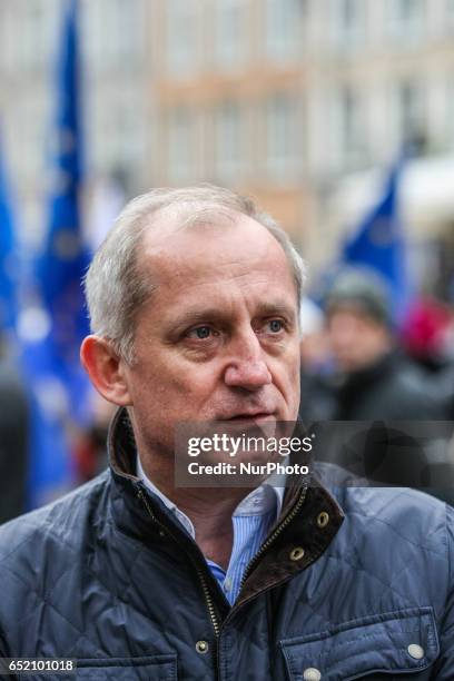 Parliament member Slawomir Neumann and protesters with European Union and Polish flags and anti-government slogans are seen on 11 March 2017 in...