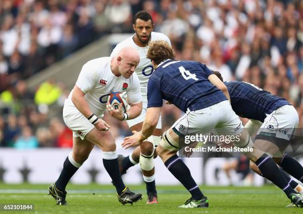 Dan Cole of England attempts to take it past Richie Gray of Scotland during the RBS Six Nations match between England and Scotland at Twickenham...