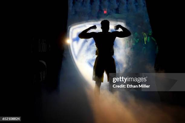 Dylan Ennis of the Oregon Ducks is introduced before a semifinal game of the Pac-12 Basketball Tournament against the California Golden Bears at...