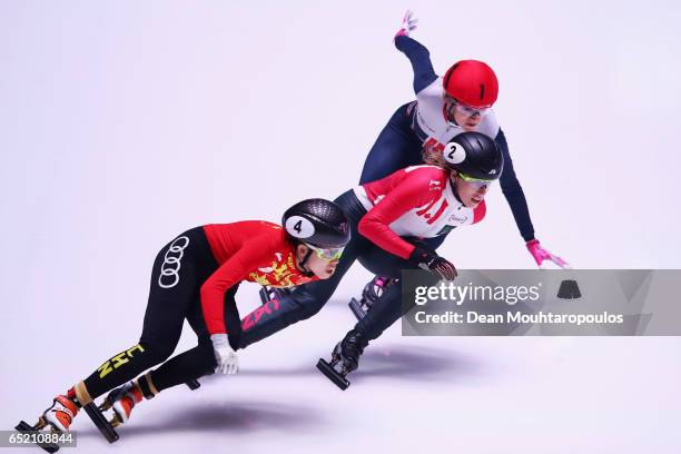 Fan Kexin of China, Marianne St-Gelais of Canada, and Elise Christie of Great Britain in the 500m Ladies race final at ISU World Short track Speed...