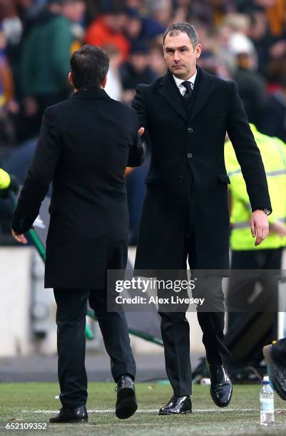 Marco Silva, Manager of Hull City and Paul Clement, Manager of Swansea City shake hands after the Premier League match between Hull City and Swansea...