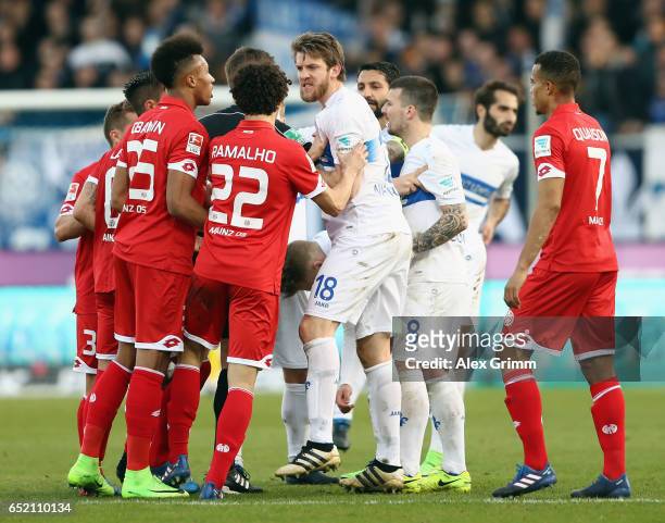 Peter Niemeyer of Darmstadt and Andre Ramalho of Mainz argue during the Bundesliga match between SV Darmstadt 98 and 1. FSV Mainz 05 at...