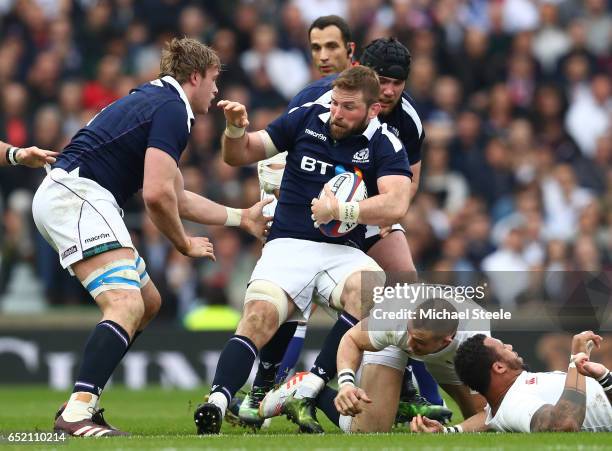 Zander Fagerson of Scotland attempts to escape a England challenge during the RBS Six Nations match between England and Scotland at Twickenham...