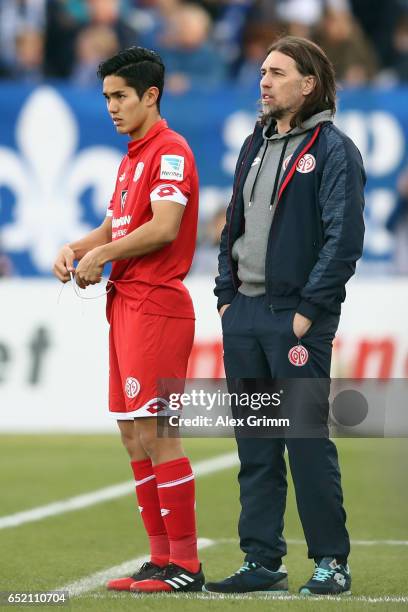 Yoshinori Muto of Mainz waits at the sideline next to head coach Martin Schmidt during the Bundesliga match between SV Darmstadt 98 and 1. FSV Mainz...