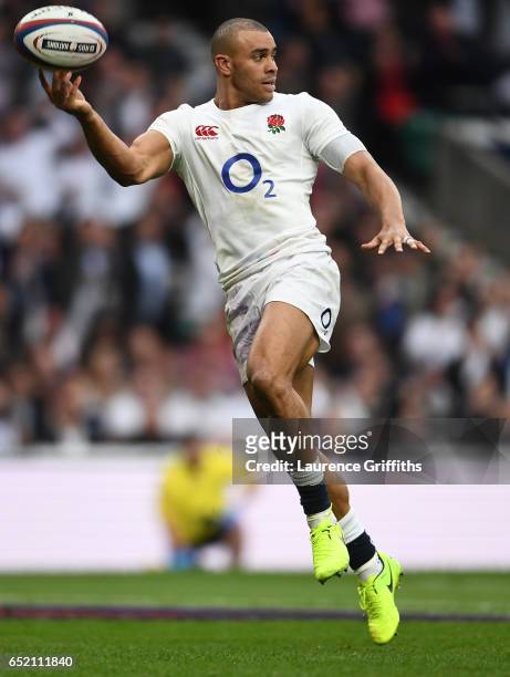 Jonathan Joseph of England scores his sides fourth try during the RBS Six Nations match between England and Scotland at Twickenham Stadium on March...