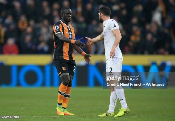 Hull City's Oumar Niasse and Swansea City's Jordi Amat shake hands after the final whistle during the Premier League match at the KCOM Stadium, Hull.
