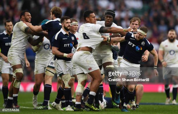 Nathan Hughes of England and Finn Russell of Scotland confront each other during the RBS Six Nations match between England and Scotland at Twickenham...