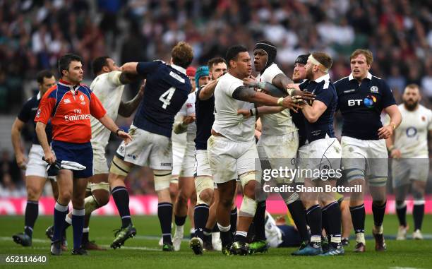 Nathan Hughes of England and Finn Russell of Scotland confront each other during the RBS Six Nations match between England and Scotland at Twickenham...