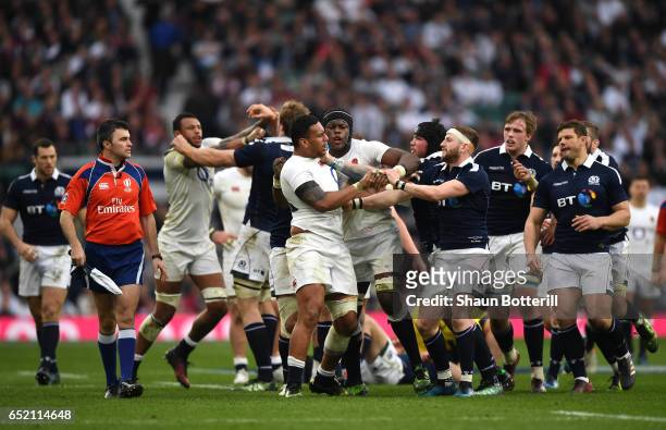 Nathan Hughes of England and Finn Russell of Scotland confront each other during the RBS Six Nations match between England and Scotland at Twickenham...